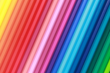 Collection of color pencils forming a backgroundの写真素材