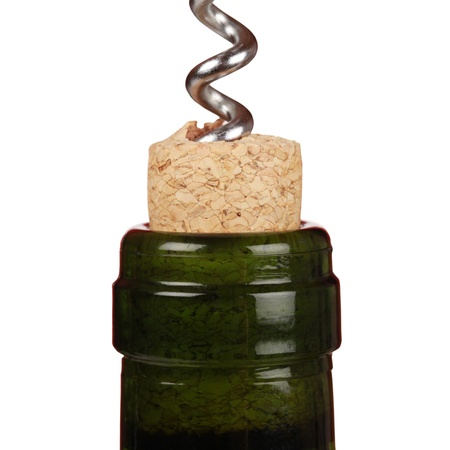 Wine bottle and a corkscrew isolated on whiteの写真素材