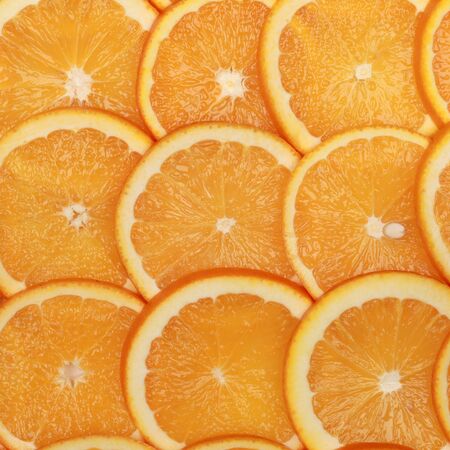 Closeup of sliced fresh oranges with copy space