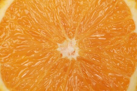Closeup of a sliced ripe orange with copyspaceの写真素材