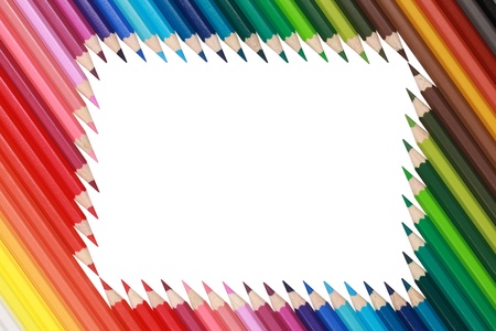 Color pencils in a row forming a frame. の写真素材