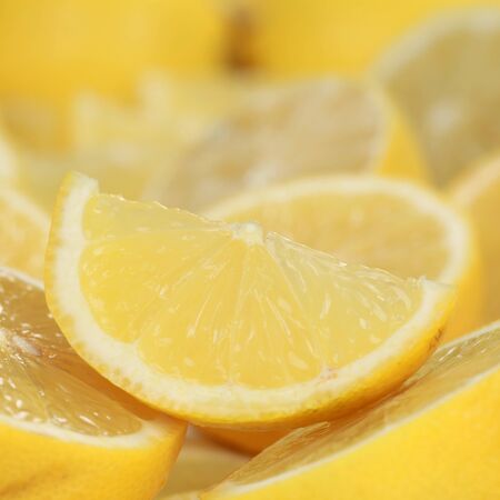 Macro shot of a sliced lemon with copy-spaceの写真素材