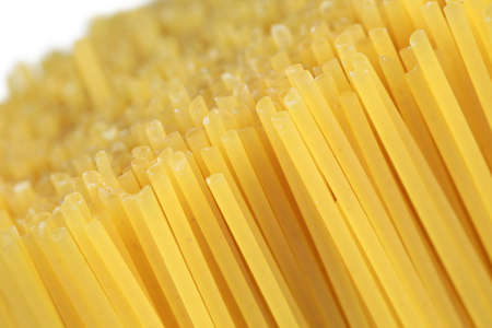 Spaghetti Pasta forming a noodle background with copy spaceの写真素材