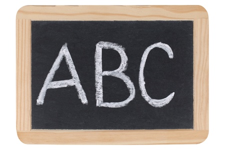 The letters ABC on a blackboard at school, isolated on whiteの写真素材