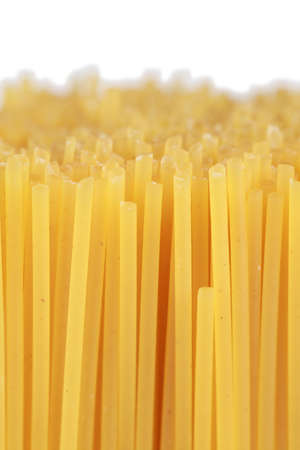 Spaghetti forming a background with copy spaceの写真素材