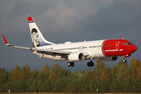 Oslo, Norway - September 16, 2012: A Norwegian Boeing 737-800 with the registration LN-NOM and Greta Garbo on the tail のeditorial素材