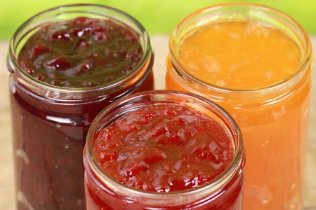 Marmalade made from strawberries, cherries and apricots in jars