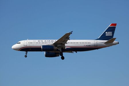 Los Angeles, California - March 21, 2013: A US Airways Airbus A320 with the registration N629AW on approach to Los Angeles Airport (LAX) in California. US Airways is a major U.S. airline, headquartered in Tempe, Arizona. It operates with 644 aircraft and のeditorial素材