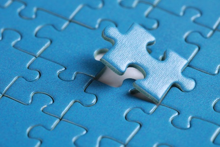 Final piece of jigsaw problem solution topicの写真素材