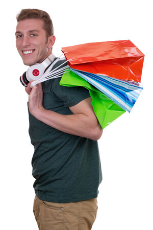 Casual young man with shopping bags, isolated on a white backgroundの写真素材