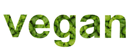 The word vegan written with vegetables and herbsの写真素材