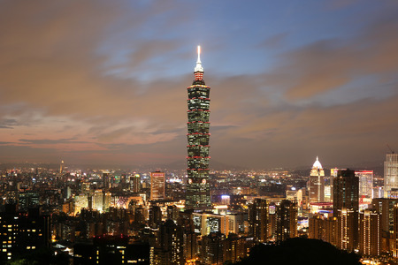 Taipei city skyline and downtown city buildings with Taipei 101 skyscraper at twilight