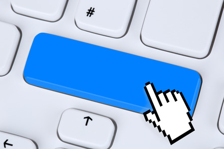 Blue enter key online on internet computer keyboard with copyspace
