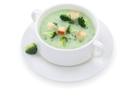 Fresh broccoli soup meal in a bowl isolated on a white backgroundの写真素材