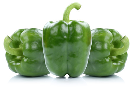 Green bell pepper peppers paprika paprikas vegetable isolated on a white backgroundの写真素材