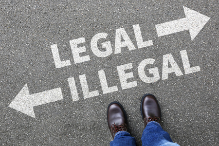 Legal illegal businessman business man concept decision prohibition allowed prohibited decide criminal law orderの写真素材