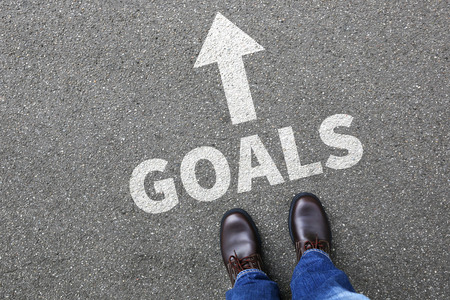 Goal goals to success aspirations and growth targets businessman business man conceptの写真素材