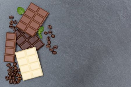 Chocolate chocolates bar food sweets slate copyspace top view from above