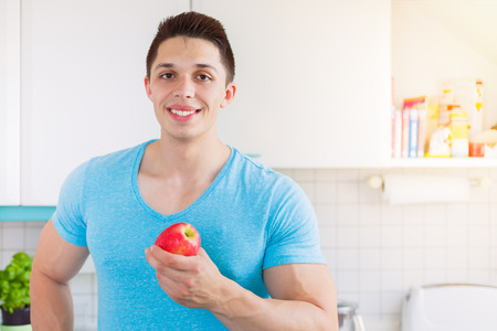 Apple fruit healthy eating young man eat copyspace copy spaceの写真素材