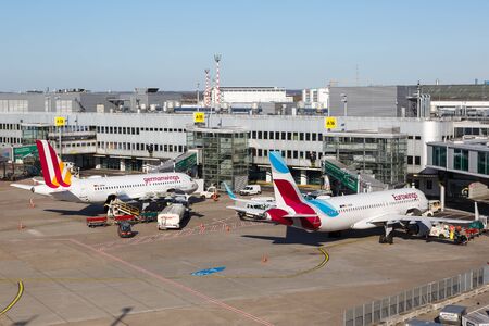 Dusseldorf, Germany â March 24, 2019: Eurowings and Germanwings Airbus airplanes at Dusseldorf Airport (DUS) in Germany.のeditorial素材