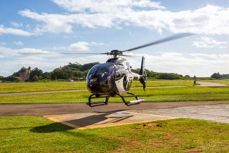 Mahe, Seychelles â€“ February 8, 2020: Zil Air Airbus H120 helicopter at Mahe airport (SEZ) in...