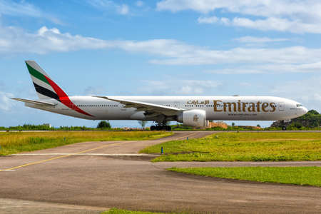 Mahe, Seychelles â€“ February 8, 2020: Emirates Boeing 777-300ER airplane at Mahe airport (SEZ)...