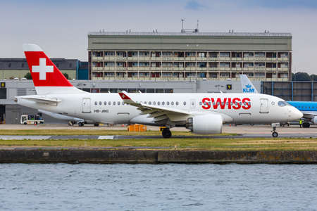 London, United Kingdom - July 7, 2019: Swiss Airbus A220 CSeries airplane at London City airport...