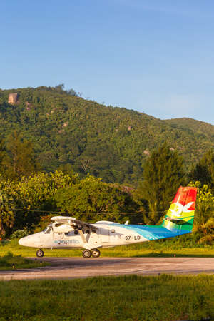 Praslin, Seychelles - February 5, 2020: Air Seychelles DHC-6-400 Twin Otter airplane at Praslin airport (PRI) in the Seychelles.のeditorial素材