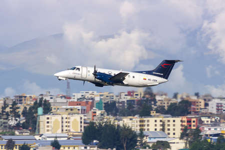 Quito, Ecuador June 16, 2011: Saereo Embraer EMB-120 airplane at Quito airport UIO in Ecuador.のeditorial素材