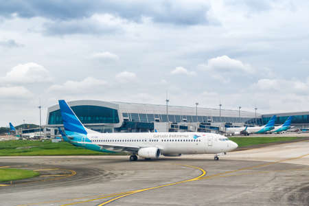 Jakarta, Indonesia January 28, 2018: Garuda Indonesia Boeing 737-800 airplanes at Jakarta airport CGK in Indonesia. Boeing is an American aircraft manufacturer headquartered in Chicago.のeditorial素材