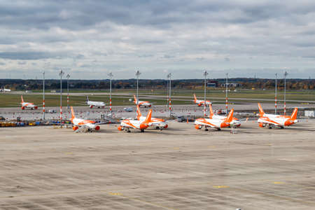 Berlin, Germany - October 28, 2020: Stored EasyJet airplanes Coronavirus Corona Virus COVID-19 Berlin Brandenburg BER airport aerial view photo in Germany.のeditorial素材