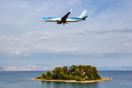 Corfu, Greece - September 19, 2020: TUI Boeing 737-800 airplane at Corfu Airport in Greece. Boeing is an American aircraft manufacturer headquartered in Chicago.のeditorial素材