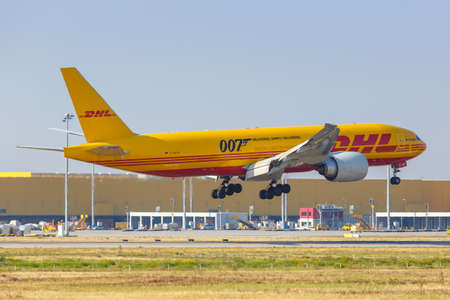 Leipzig, Germany - August 19, 2020: DHL Boeing 777F airplane at Leipzig Halle LEJ Airport in...