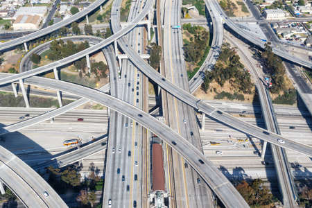 Century Harbor Freeway interchange intersection junction Highway Los Angeles roads traffic America city aerial top view photoのeditorial素材