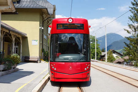 Fulpmes, Austria - August 1, 2020: Stubaitalbahn Innsbruck Tram Bombardier train Fulpmes station in Austria.のeditorial素材