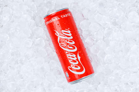 Stuttgart, Germany - January 17, 2021: Coca Cola Coca-Cola lemonade soft drink in can ice cubes in Stuttgart in Germany.のeditorial素材
