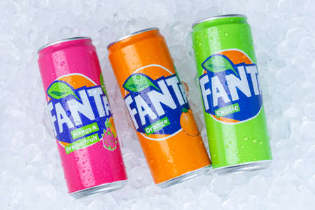 Stuttgart, Germany - January 17, 2021: Fanta lemonade soft drinks in cans ice cubes in Stuttgart in Germany.のeditorial素材