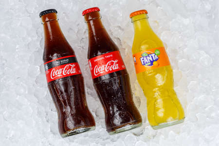 Stuttgart, Germany - January 17, 2021: Coca Cola Coca-Cola Fanta Sprite products lemonade soft drink bottle ice cubes in Stuttgart in Germany.のeditorial素材