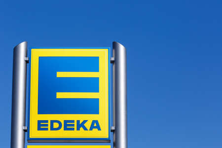 Stuttgart, Germany - May 17, 2020: Edeka logo sign supermarket food shop copyspace copy space in...