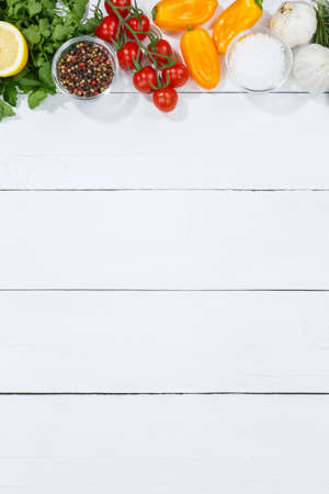Vegetables healthy vegan clean eating organic food copyspace copy space on a wooden board portrait formatの写真素材