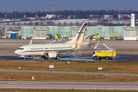 Stuttgart, Germany - January 15, 2021: De-icing of a Gainjet Ireland Boeing 737-700 (BBJ) airplane...