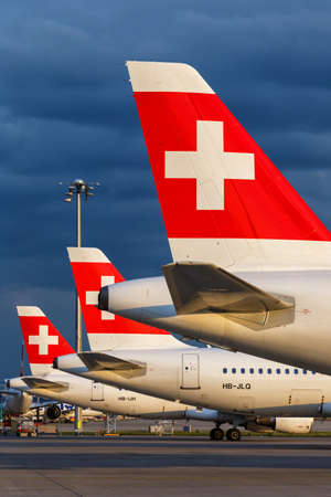 Zurich, Switzerland - July 22, 2020: Swiss Airbus A320 airplane tails at Zurich Airport (ZRH) in...