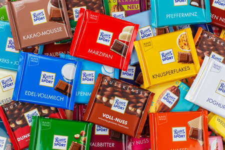 Stuttgart, Germany - March 1, 2021: Ritter Sport chocolate chocolates different types variety background in Germany.のeditorial素材