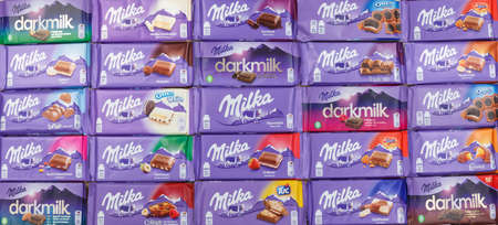 Stuttgart, Germany - March 3, 2021: Milka chocolate chocolates different types variety background banner in Germany.のeditorial素材