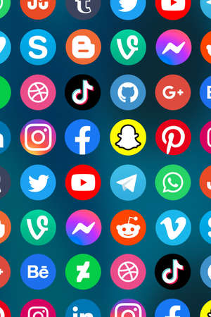 Stuttgart, Germany - April 5, 2021: Logo of social media icons marketing network Facebook, Instagram, YouTube, Twitter and WhatsApp on the internet portrait format in Stuttgart, Germany.のeditorial素材