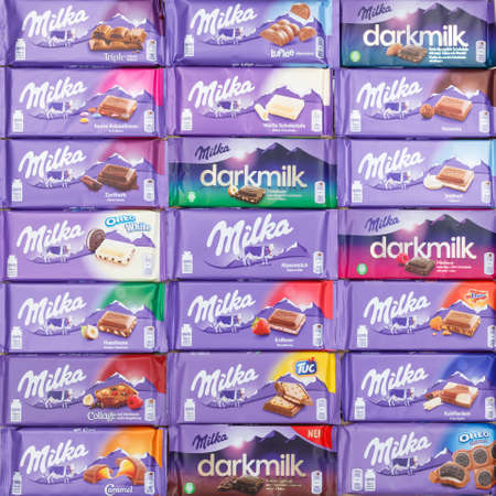 Stuttgart, Germany - March 3, 2021: Milka chocolate chocolates different types variety background square in Germany.のeditorial素材
