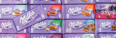 Stuttgart, Germany - March 3, 2021: Milka chocolate chocolates different types variety background banner in Germany.のeditorial素材