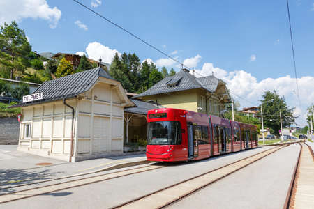 Fulpmes, Austria - August 1, 2020: Stubaitalbahn Innsbruck Tram train Fulpmes station in Austria.のeditorial素材