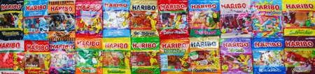 Stuttgart, Germany - March 7, 2021: Haribo gummy bear gummi candy candies different types variety background banner in Stuttgart, Germany.のeditorial素材