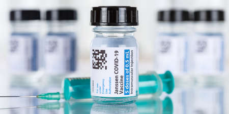 Stuttgart, Germany - March 19, 2021: Johnson & Johnson Coronavirus Vaccine Corona Virus COVID-19 Covid syringe vaccines copyspace copy space banner in Germany.のeditorial素材